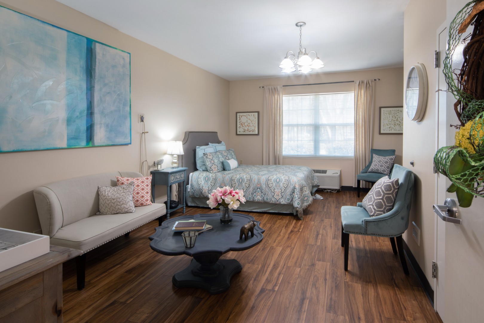 Suite with a window and comfortable seating